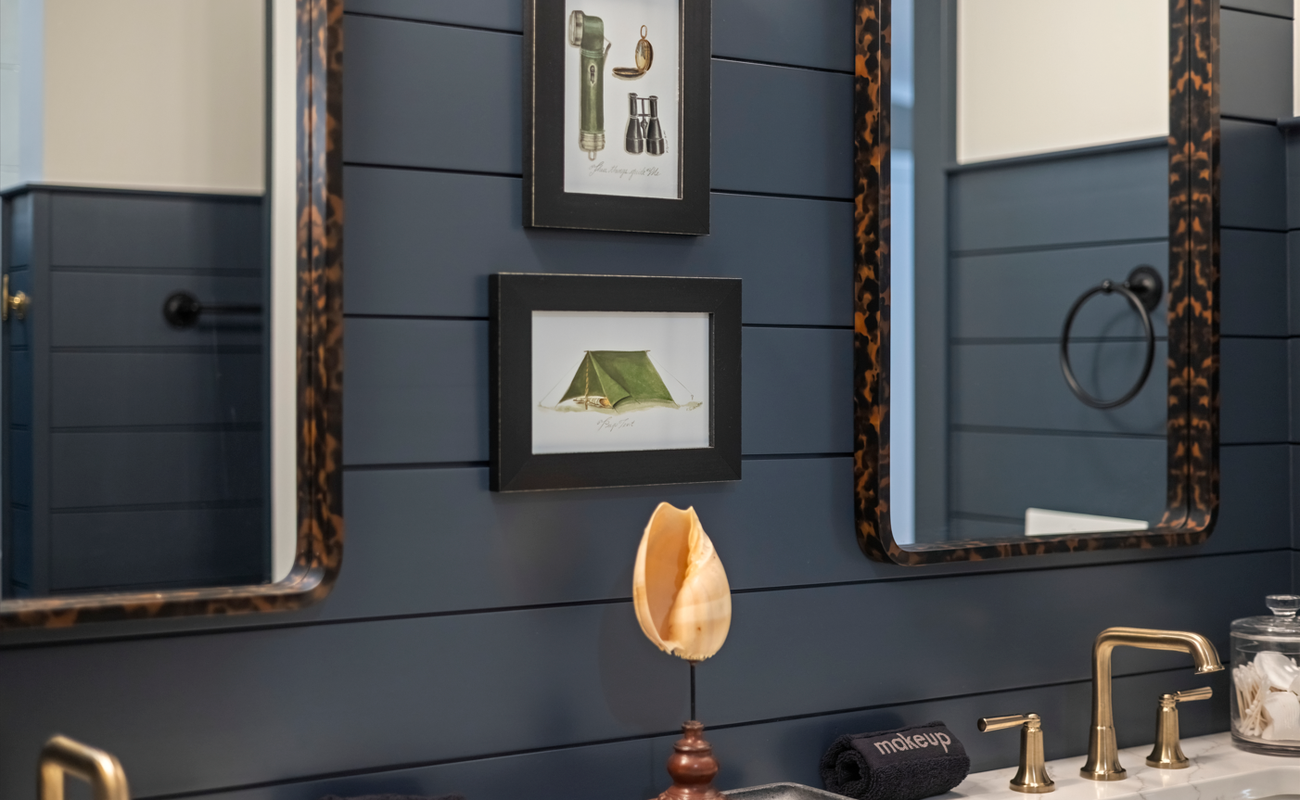 Nautical tones and vintage touches define this inviting bath.