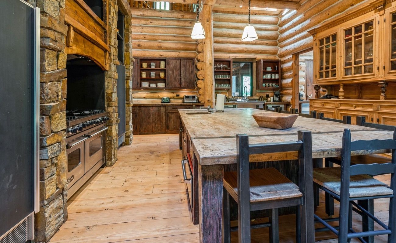 A rustic gourmet hub perfect for family feasts and fireside treats.