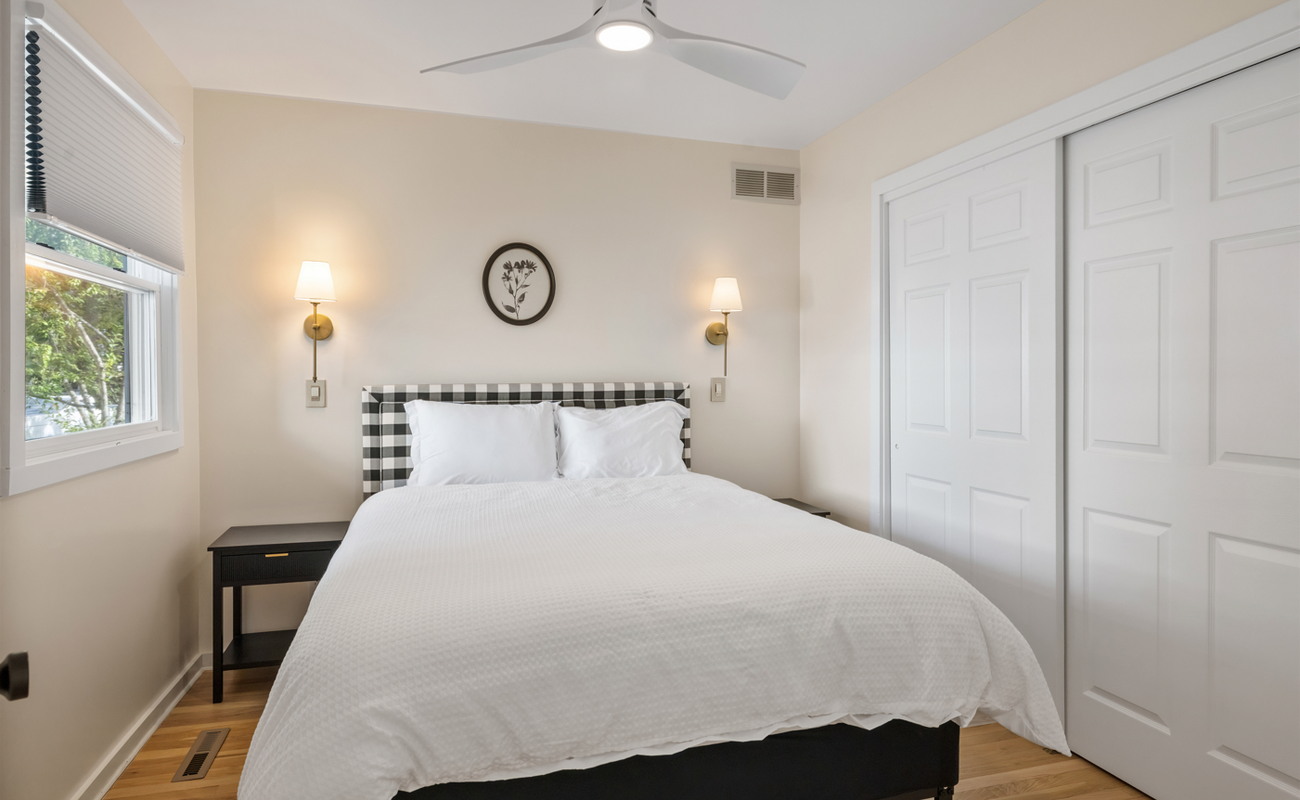 Bedroom 3 is on the main level & has a queen-size bed.