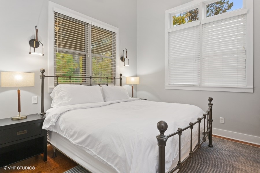 Primary bedroom is on the main level & has a king-size bed.