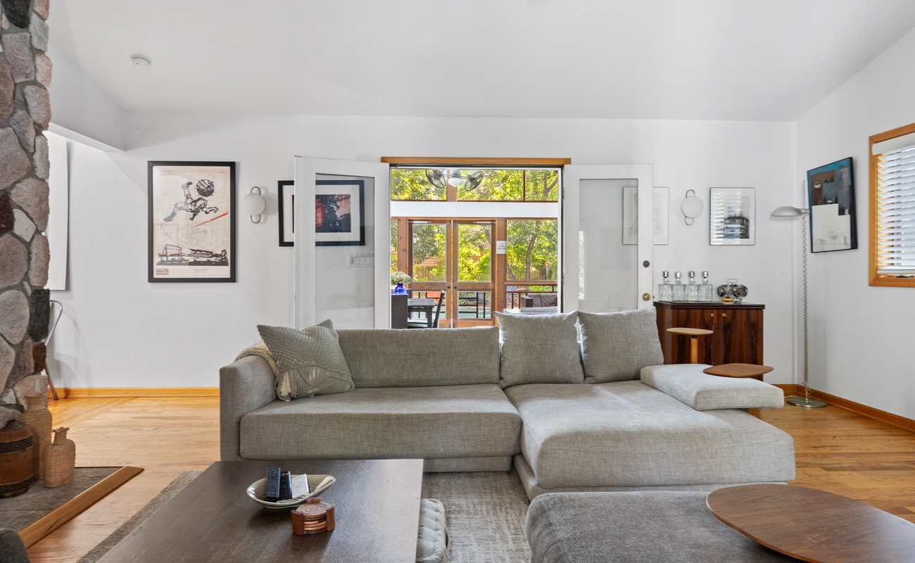 The main living area features natural light, and plenty of comfortable seating to relax.