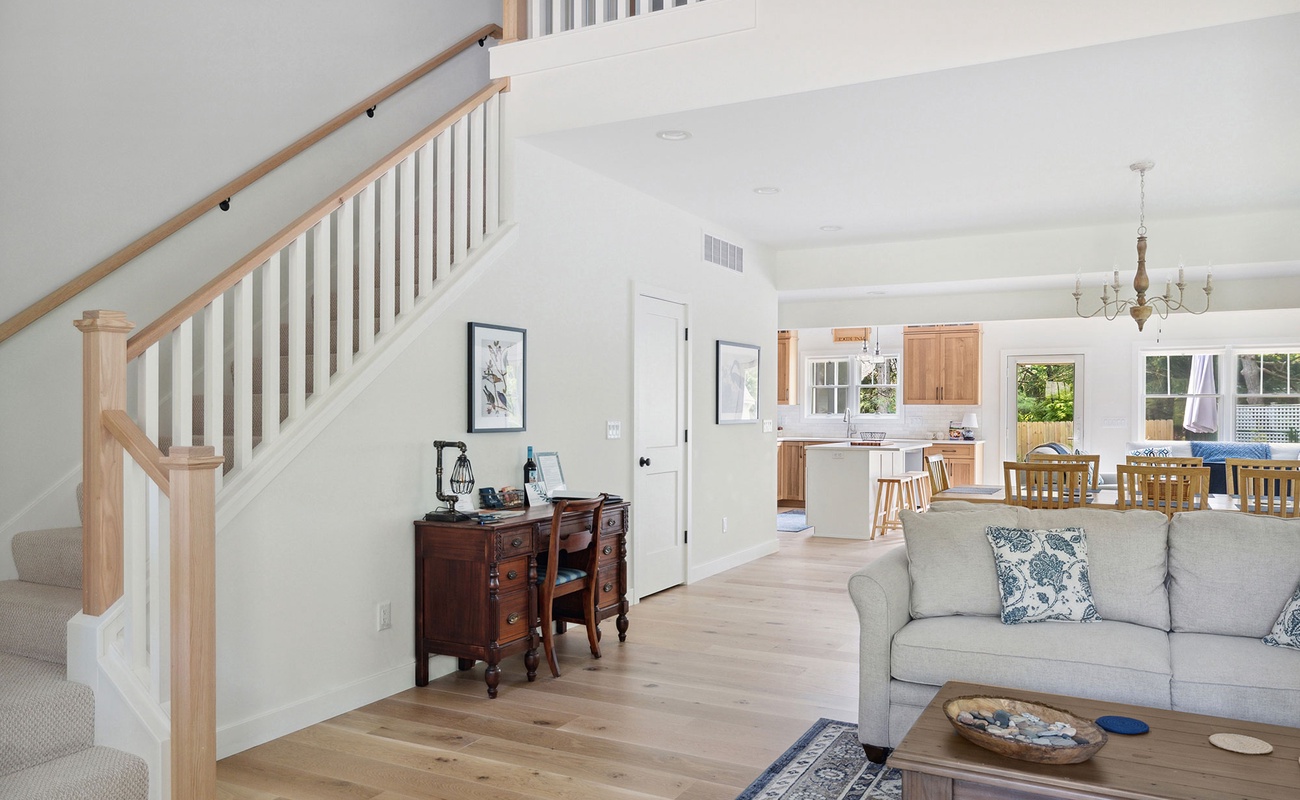 Head upstairs and find 2 more bedrooms and the comfy lounge area.