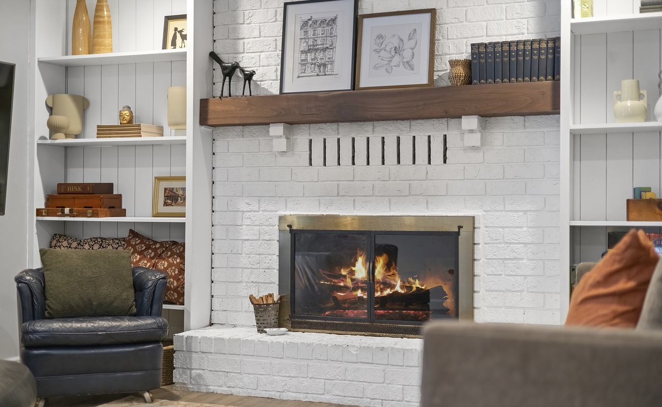 A firelit corner perfect for cards, books, and laughter.