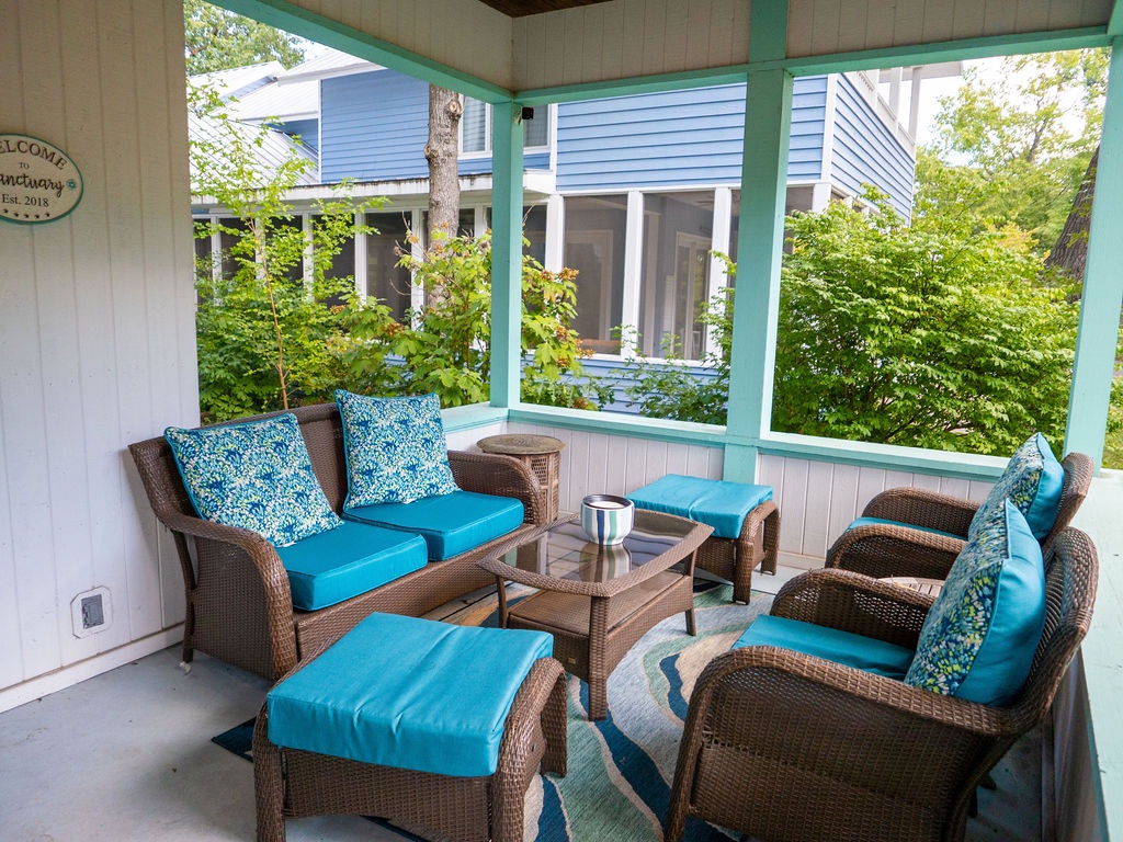 Hang out on the front porch with plush seating and neighborhood views.