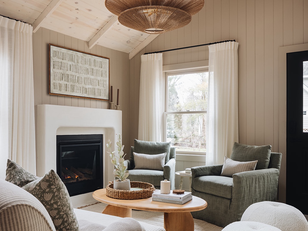 Sipping a fave beverage with family or friends in front of the fire. Vacay 101.