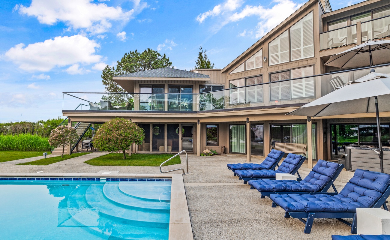 Luxury unfolds across every level of this stunning retreat.