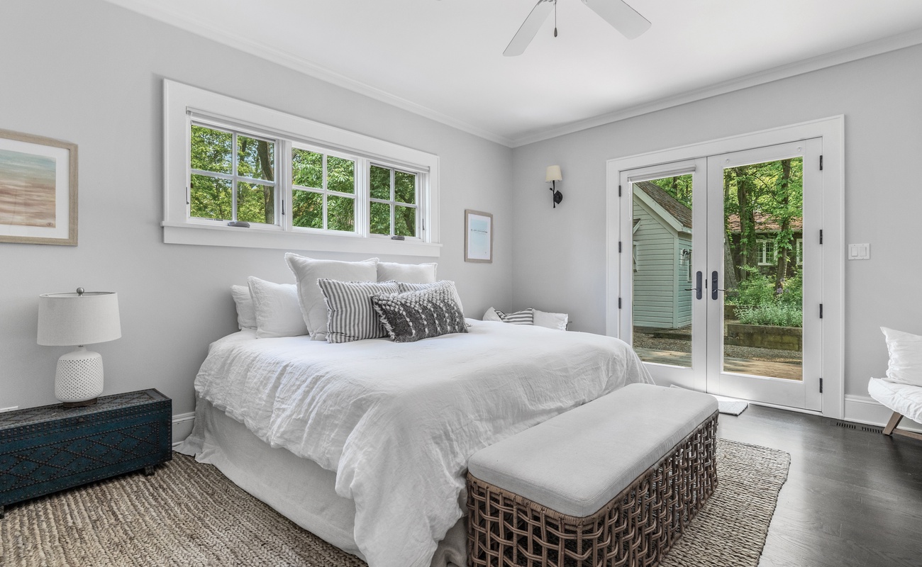 Primary bedroom is on the main level & has a king-size bed.