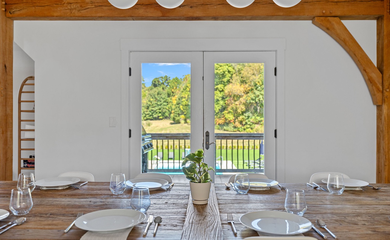 Plates, glasses, and a backdrop that takes your breath away—bon appétit with a view!