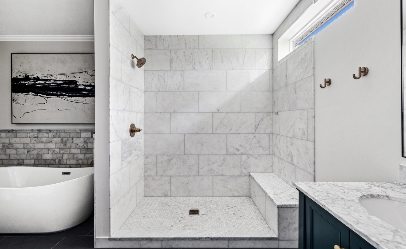 Escape to the ultimate oasis of relaxation in the primary ensuite bathroom.