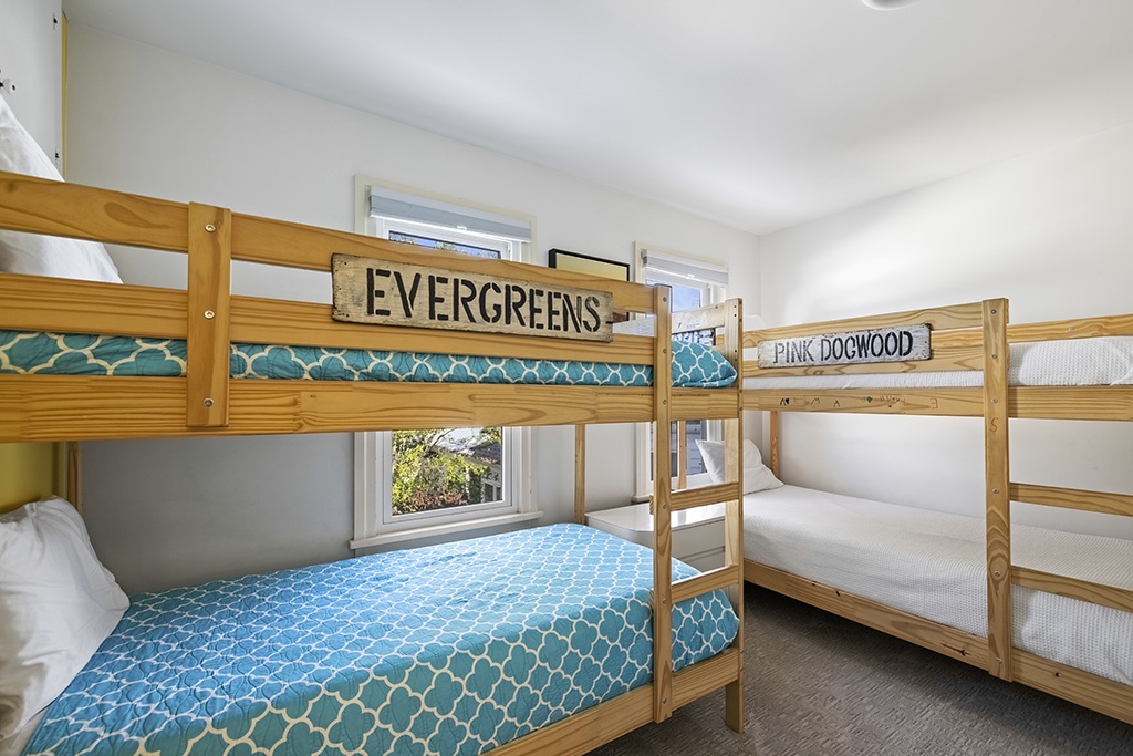 Bedroom 3 in The Farmhouse is on the upper level and has 2 twin-size bunkbeds.