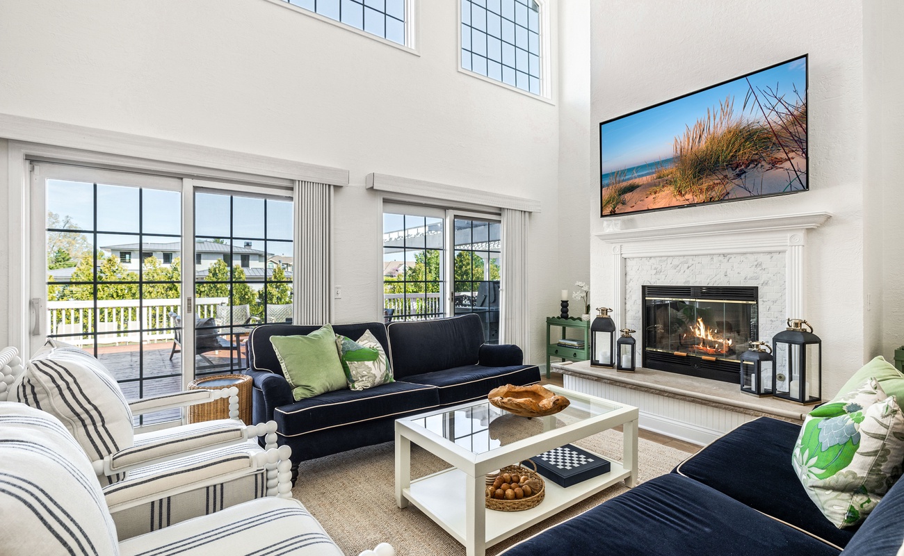 Grand living space with warmth, light, and style.