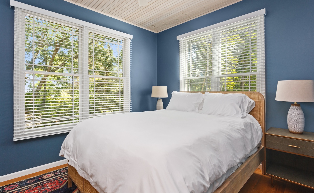 Bedroom 2 is on the main level & has a queen-size bed.