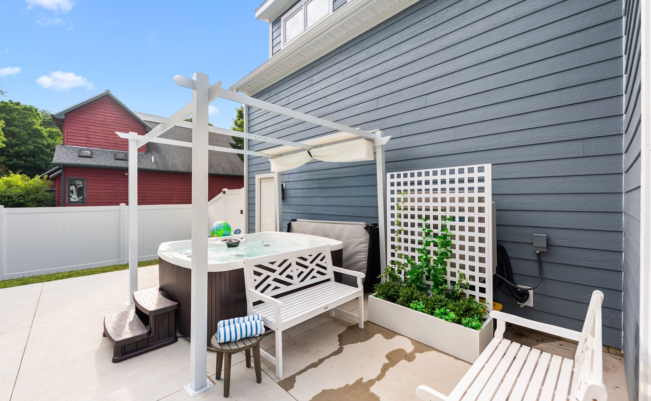 Pop the bubbly and soak under the sun. Your private hot tub oasis awaits!