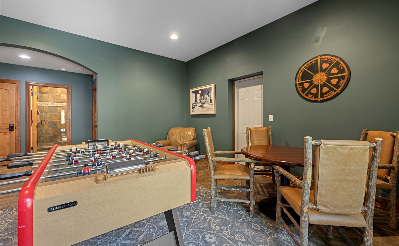 A game room with foosball table and other activities provides entertainment for everyone.