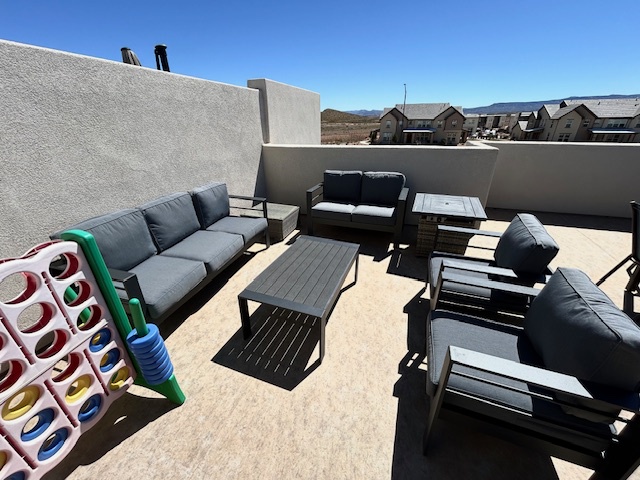 Top Floor Deck Seating. Fire Table Right Corner