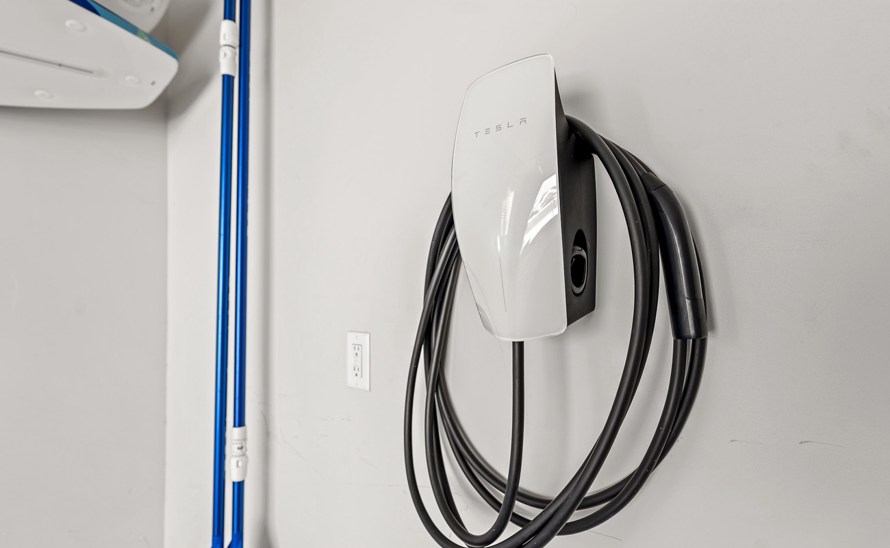 2 EV chargers, 1- NACS plug and a J1772 plug, 2- 1450 NEMA plug