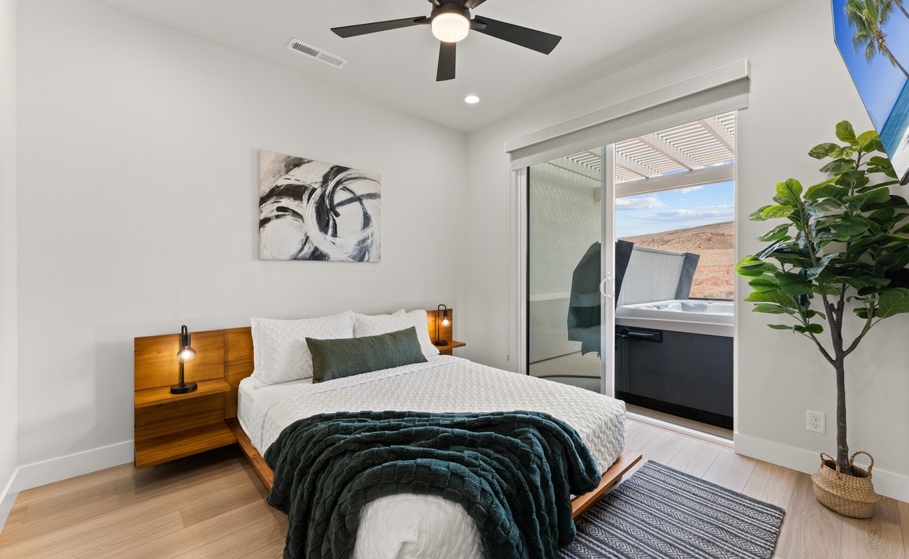 Queen Bedroom with View of Balcony