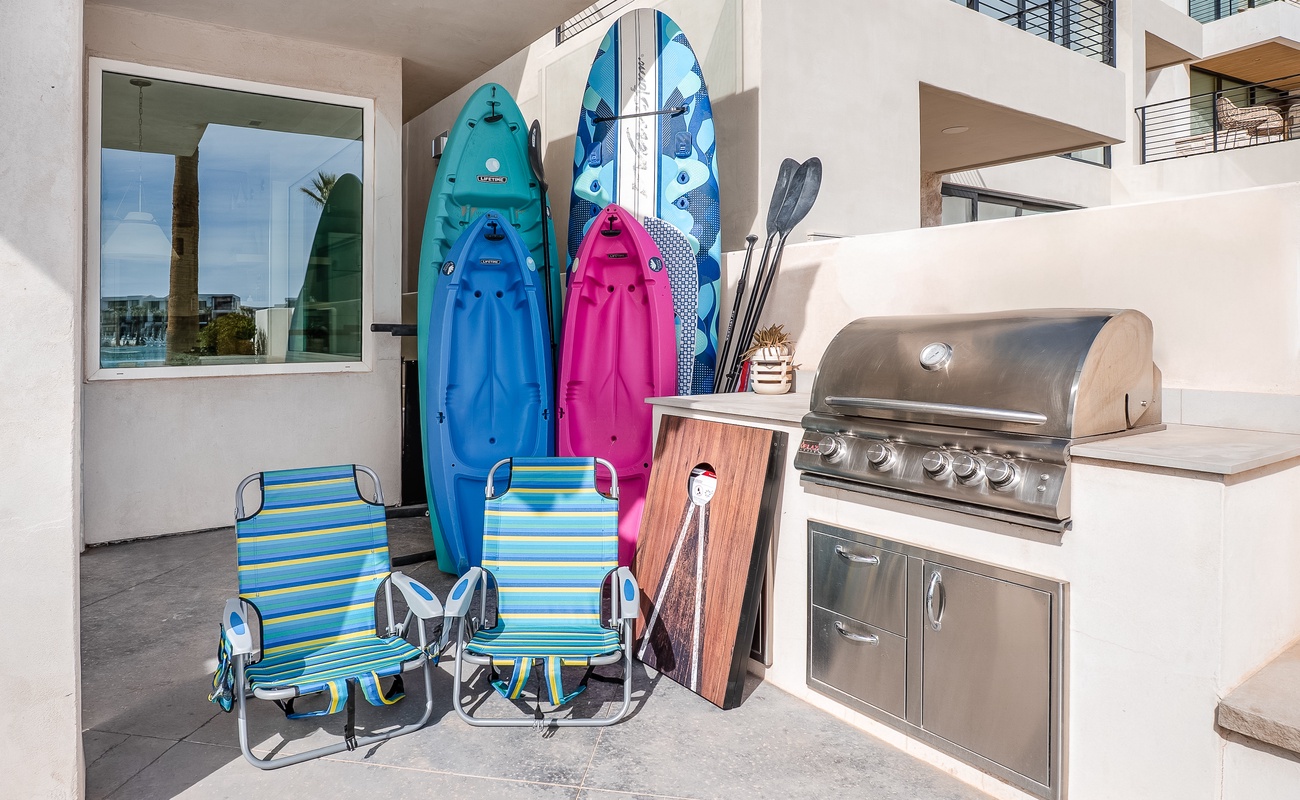 Kayaks, Paddleboards, Cornhole, Beach Chairs, and Beach Umbrella