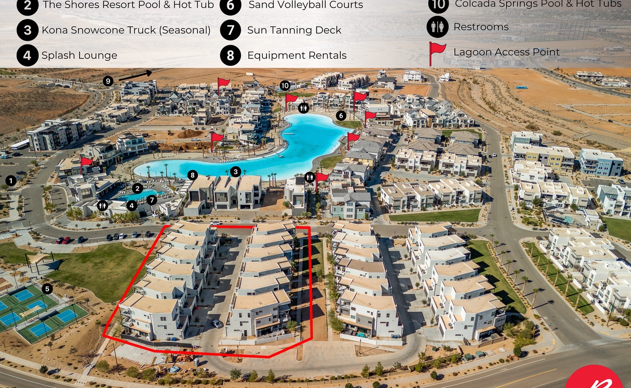 Aerial view of a resort community featuring modern accommodations, recreational facilities, pools, and desert landscape surroundings.