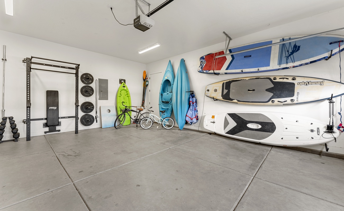 Your adventure gear awaits in this spacious garage - grab kayaks, paddleboards, and bikes for endless water and land exploration.