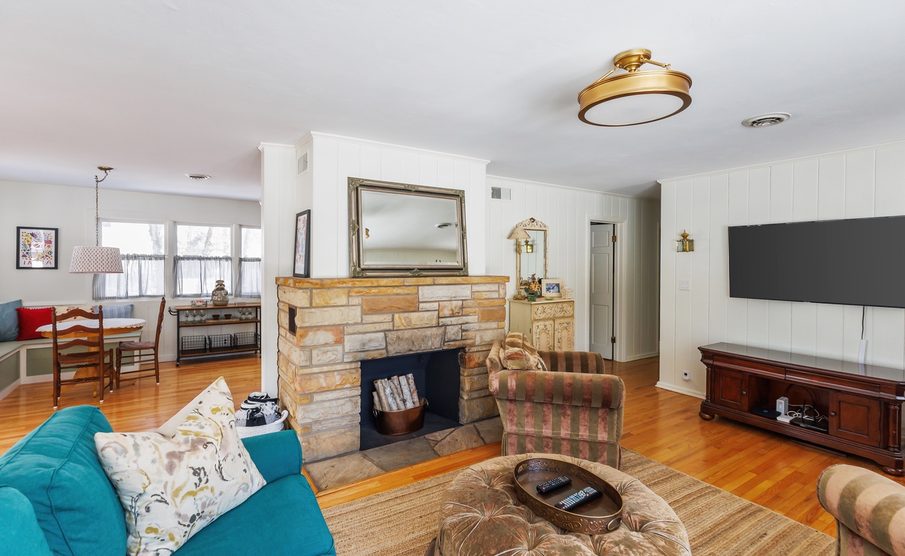 Charming cottage living space with soft seating