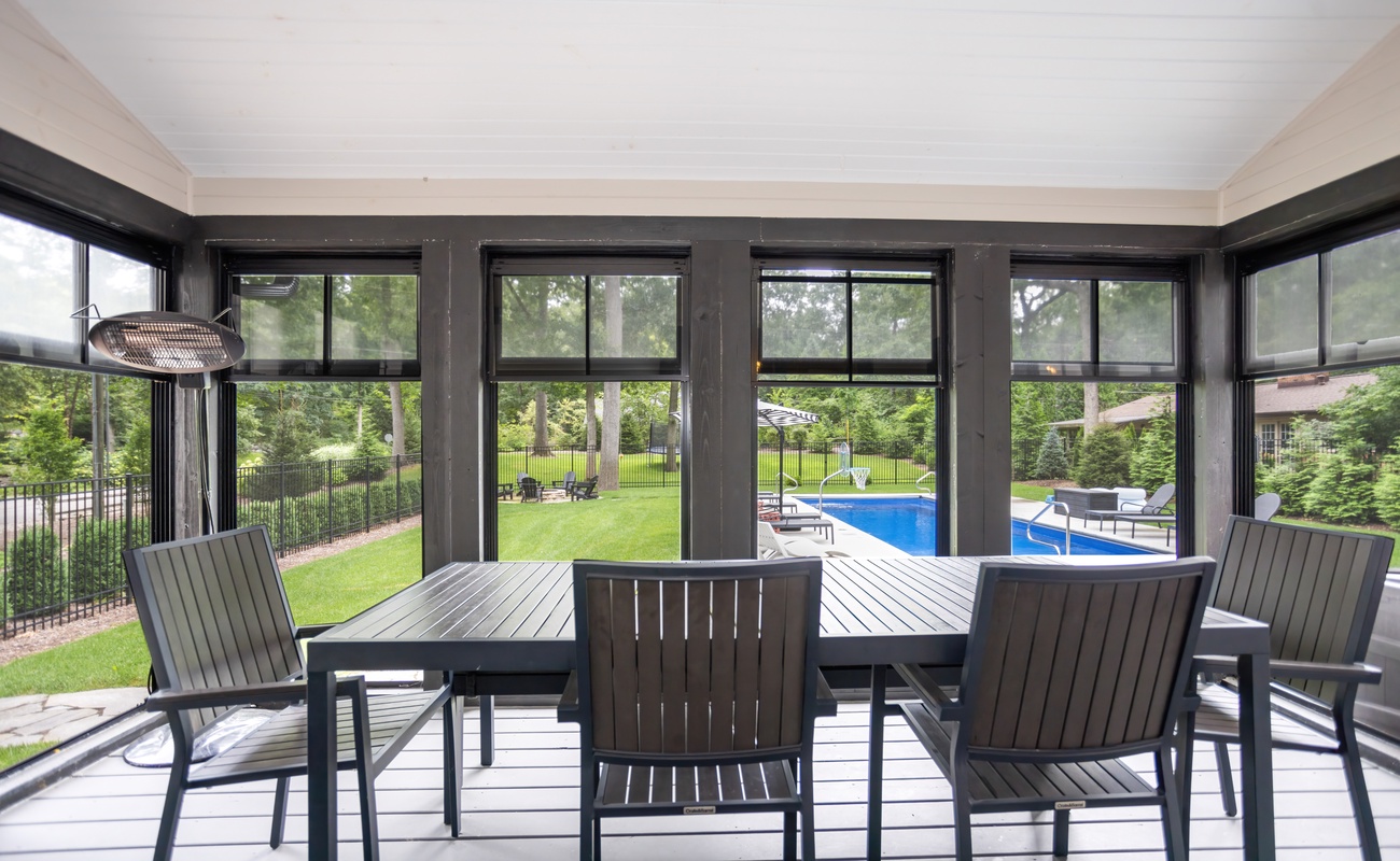 Beautiful screen porch overlooking the beautiful pool area