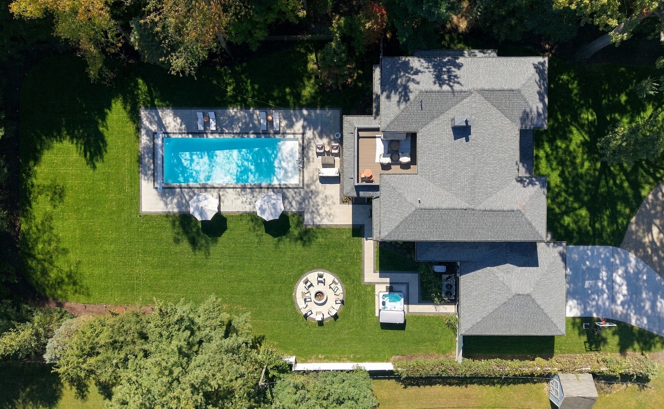 Aerial View of the Expansive Backyard with Private Pool, Hot Tub & Fire Pit Area