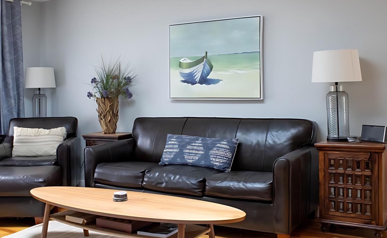 Sleeper sofa with art that brings the beach in