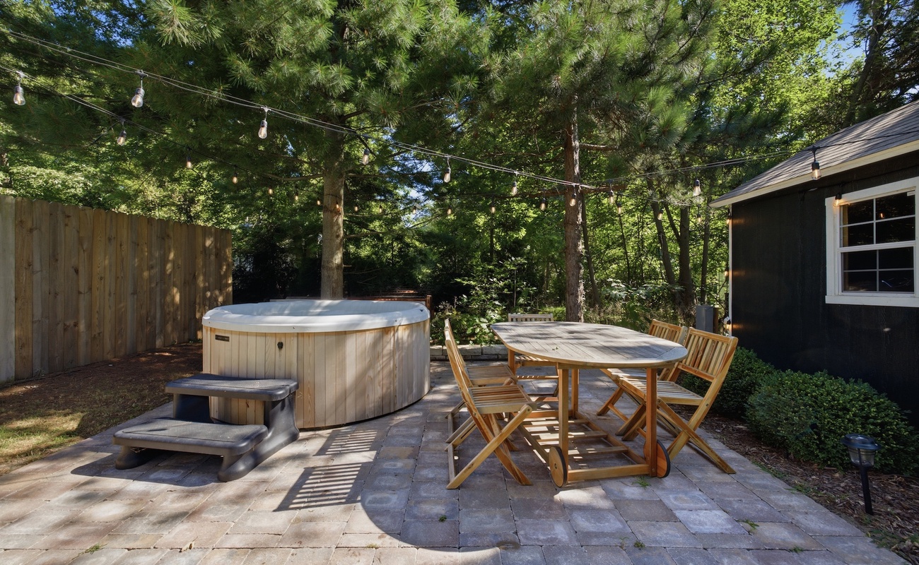 Unwind under the string lights with a soak in the private hot tub