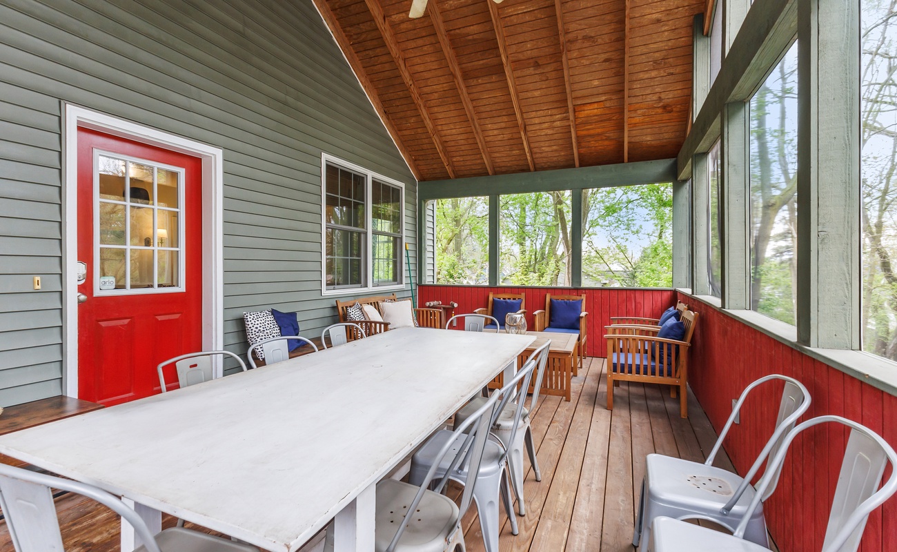 Large screen porch with seating and dining perfect for evening meals or morning coffee