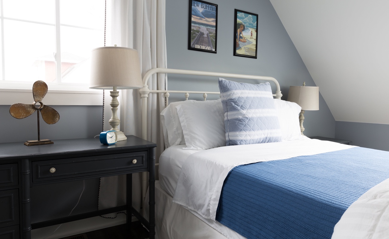 Comfortable queen bed with cottage charm