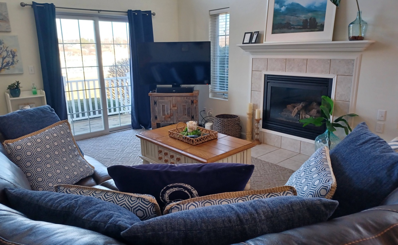 Living Room with fireplace, cable TV