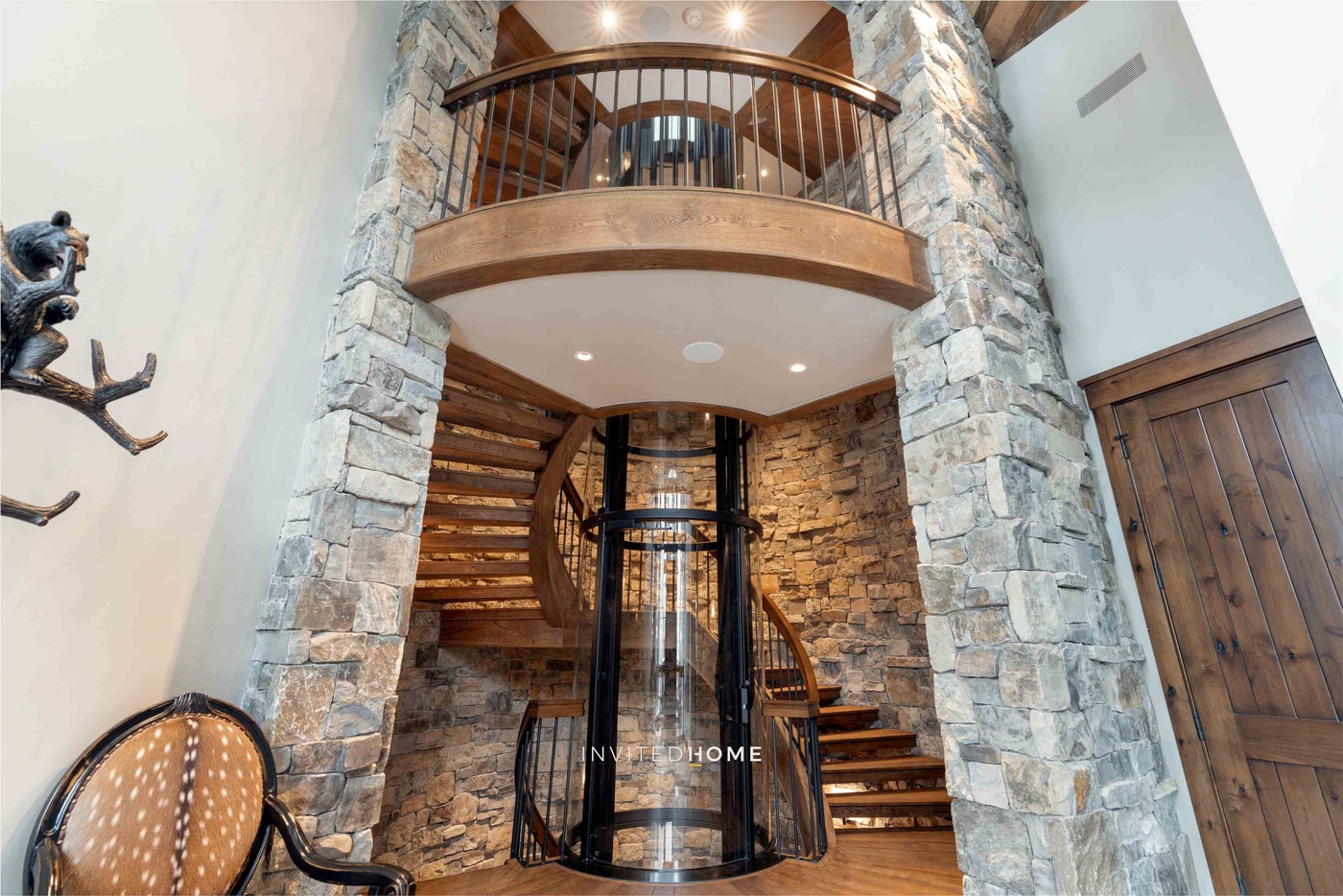 Glass Elevator & Spiral Staircase