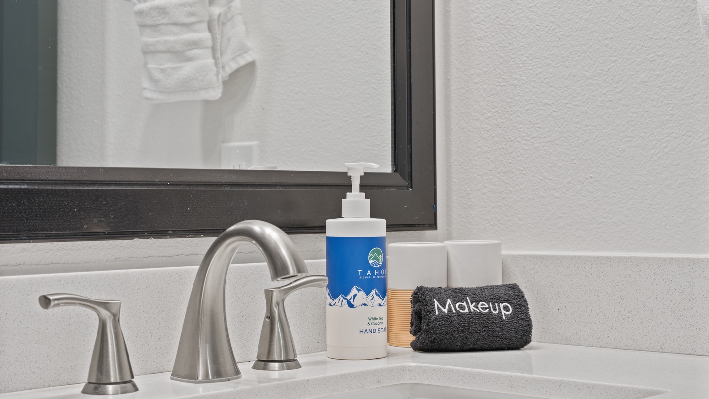 Your private bathroom features fresh towels and thoughtfully curated amenities, ensuring you have everything you need for a comfortable stay.