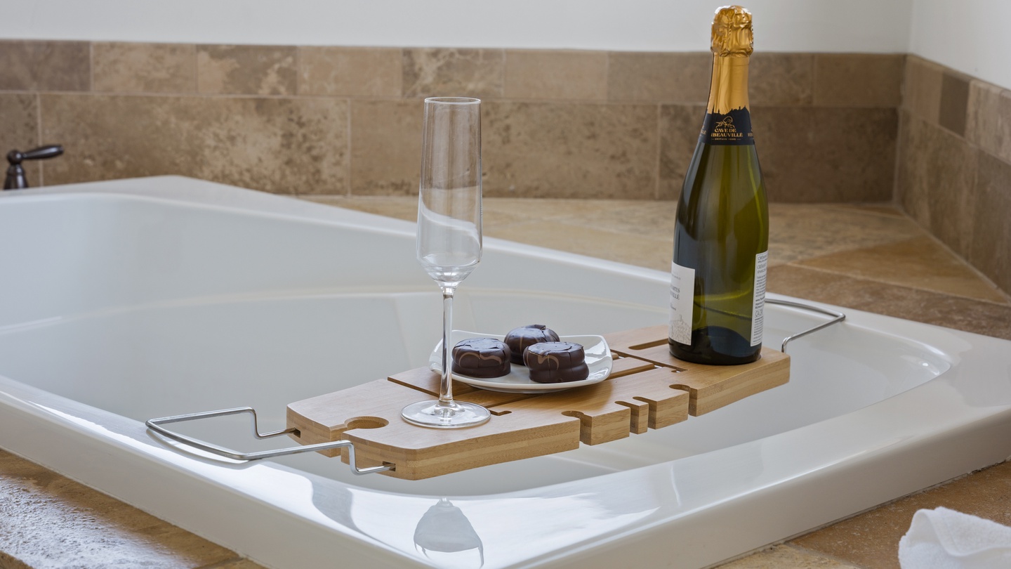 Sink into pure indulgence with a luxurious soak, complete with champagne and chocolates—your ultimate escape after a day of exploring awaits.