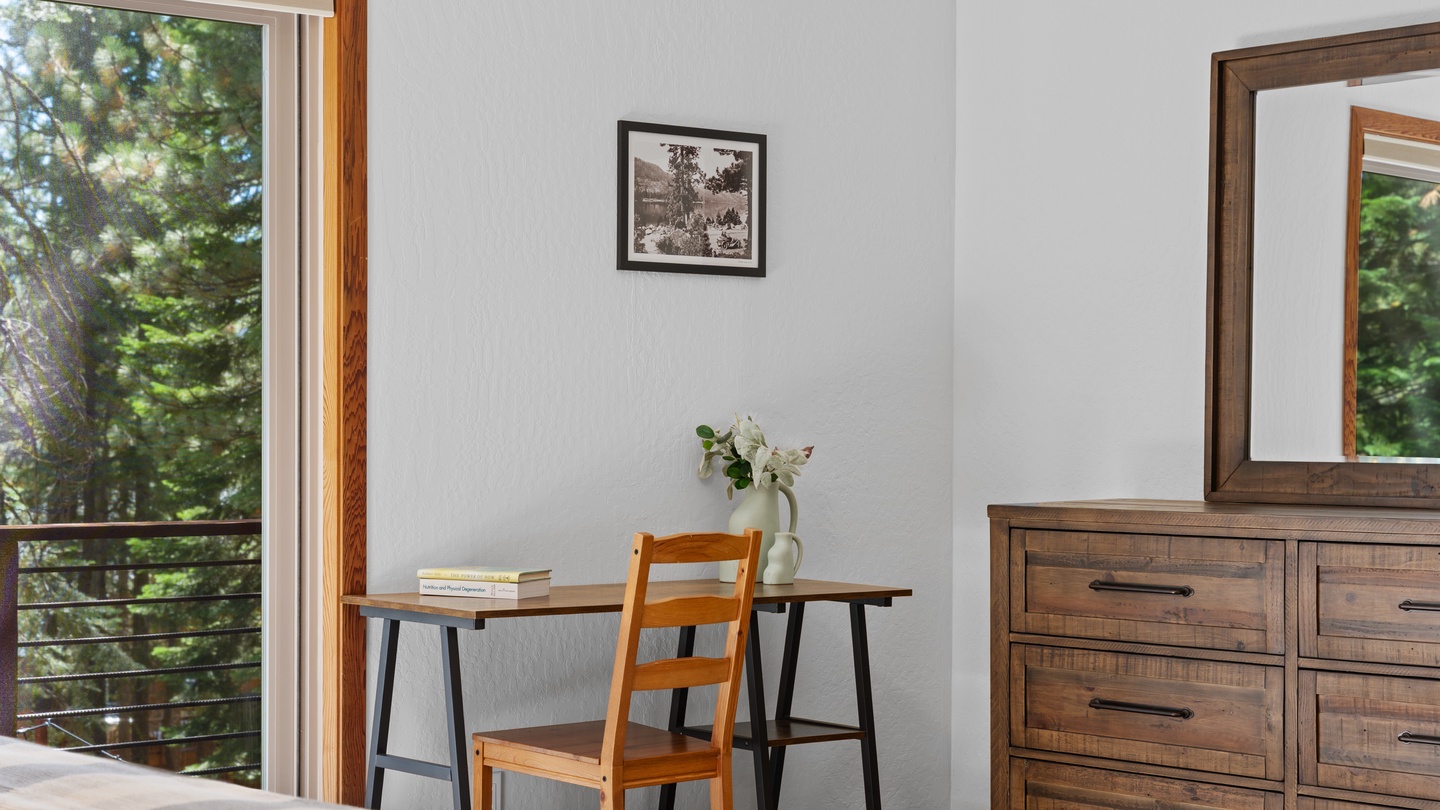 Settle in at your private desk overlooking the forest, where natural light and peaceful greenery create the perfect spot for morning coffee or quiet reflection.