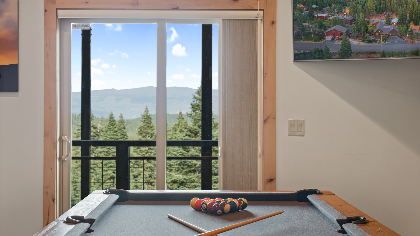 Challenge your travel companions to a friendly game of pool while taking in the stunning mountain vistas through the glass doors, or step outside to the balcony for fresh alpine air.