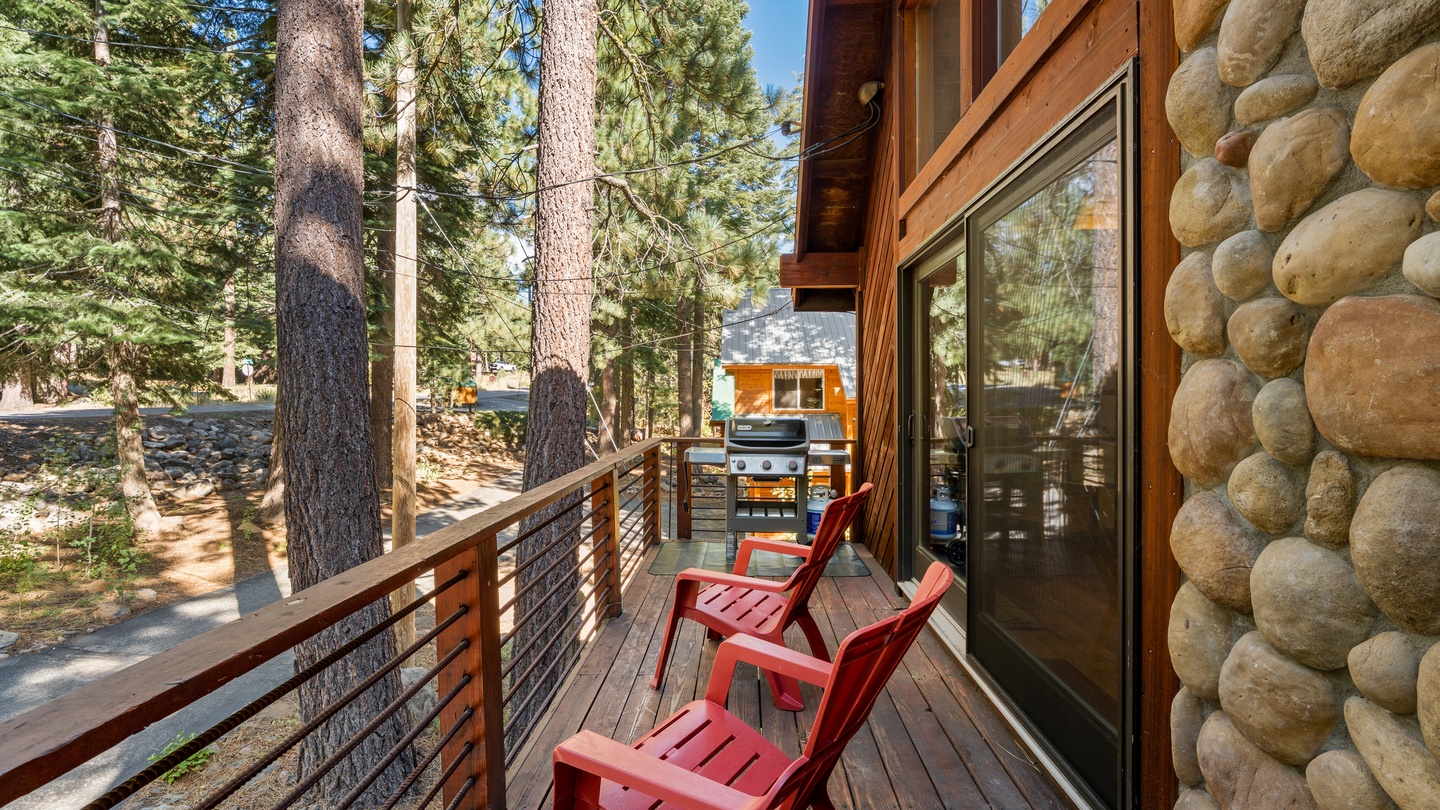 Settle into bright red Adirondack chairs on your private deck, surrounded by towering pines and fresh mountain air. Fire up the grill and breathe in the scent of the forest—your peaceful retreat awaits.