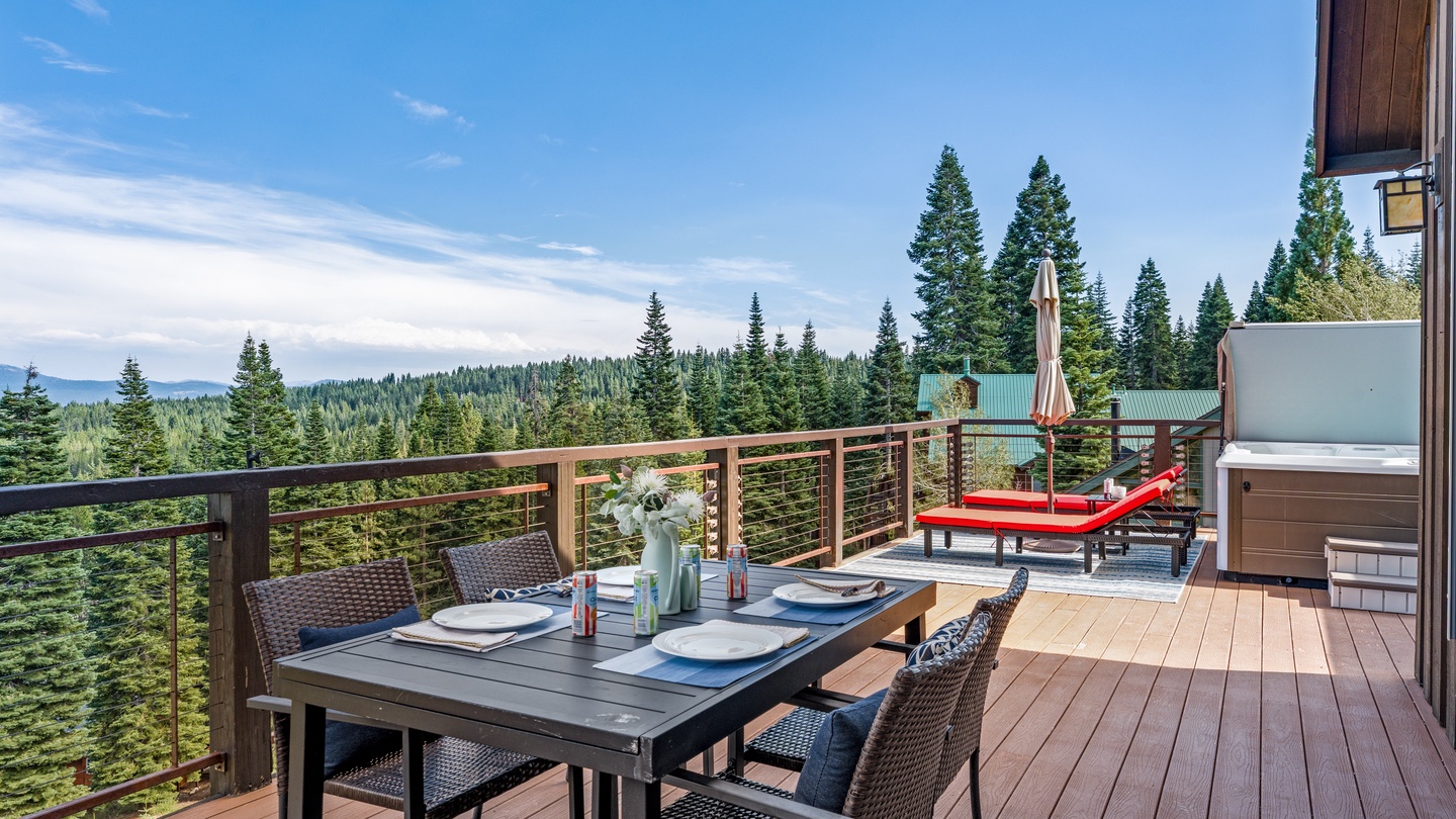 Step onto your private deck and breathe in the crisp mountain air as endless treetops stretch before you. Dine alfresco at the outdoor table, soak in the hot tub beneath the stars, or simply unwind while nature's beauty unfolds.