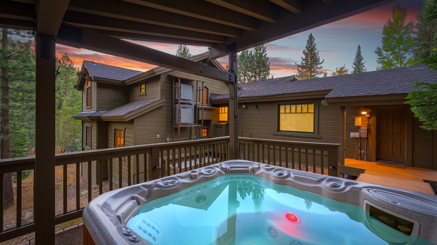 Unwind in your private hot tub as the day fades into a stunning mountain sunset, surrounded by towering pines and fresh alpine air.