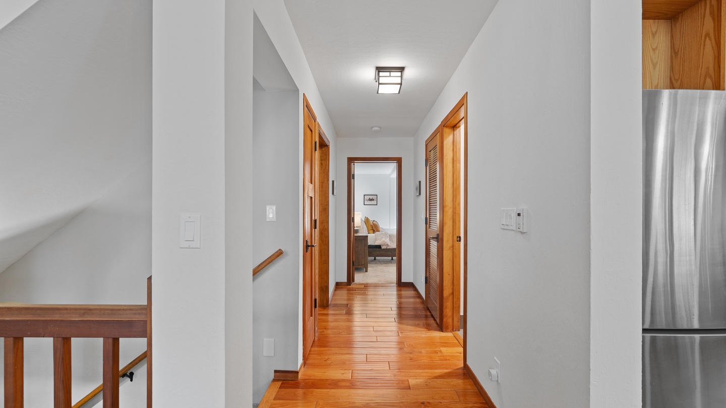 Gleaming hardwood floors and warm wood accents lead you through the home, where thoughtful design meets comfortable living.