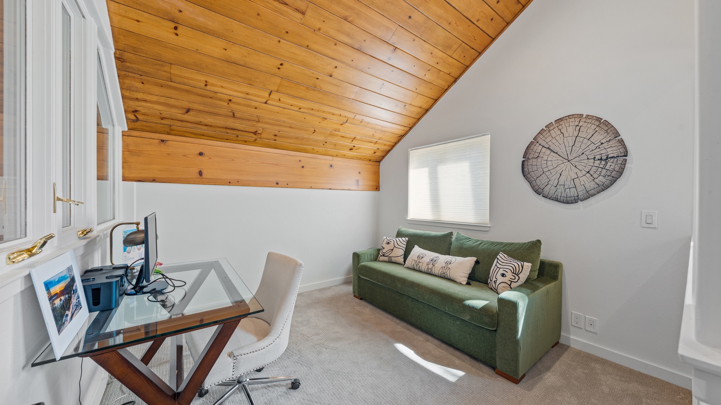 Step into your private work-from-away retreat, where warm pine ceilings and natural light create the perfect balance of focus and relaxation.