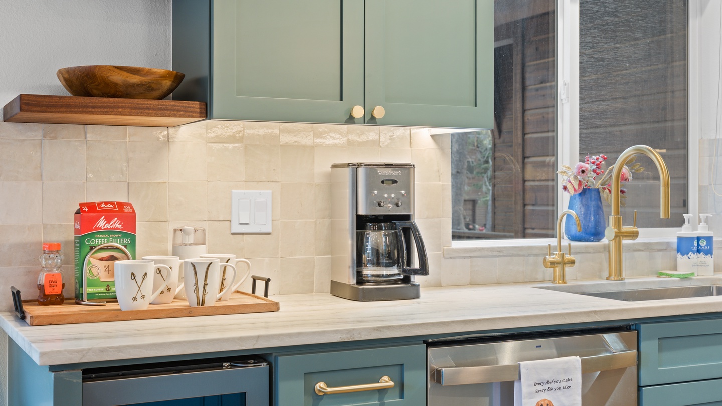 Your kitchen comes stocked with a coffee maker and all the essentials for a perfect morning cup, ready whenever you are.