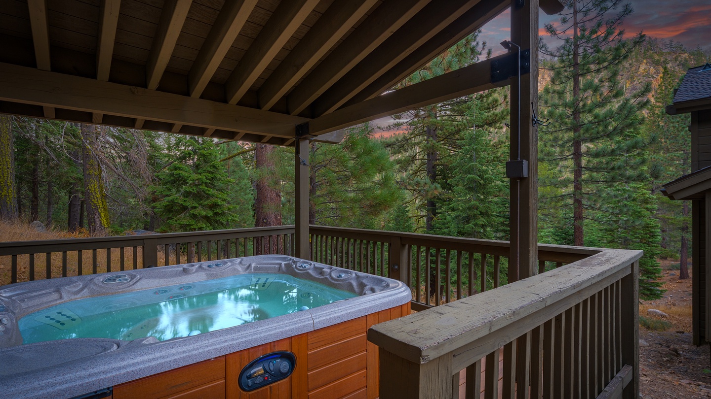 Soak beneath the stars in your private hot tub, surrounded by towering pines and the peaceful sounds of nature—perfect for unwinding after a day of mountain adventures.