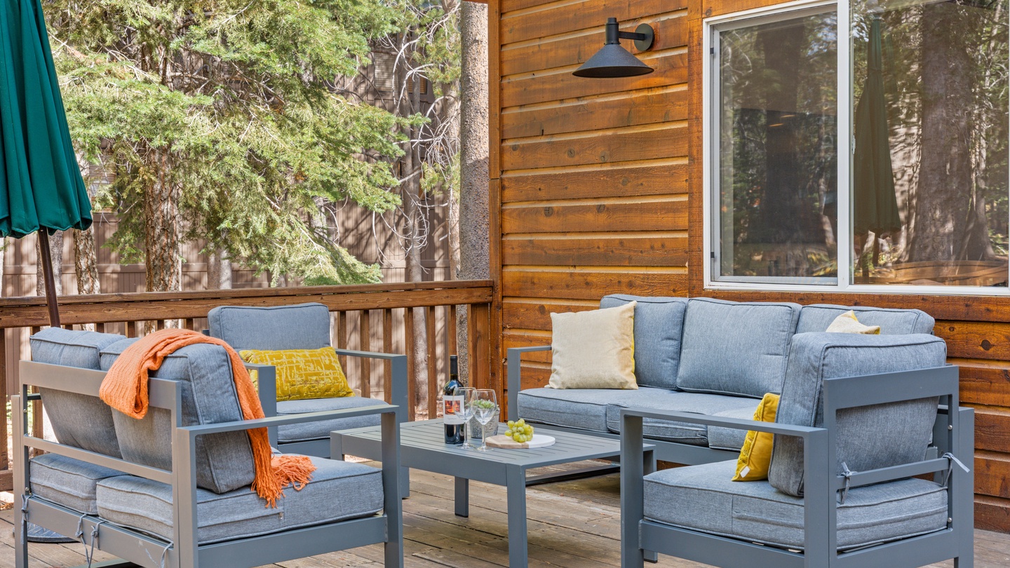 Unwind on your private deck surrounded by tall pines. Sink into plush cushions with a refreshing drink, feel the mountain breeze, and let the peaceful forest setting wash over you.