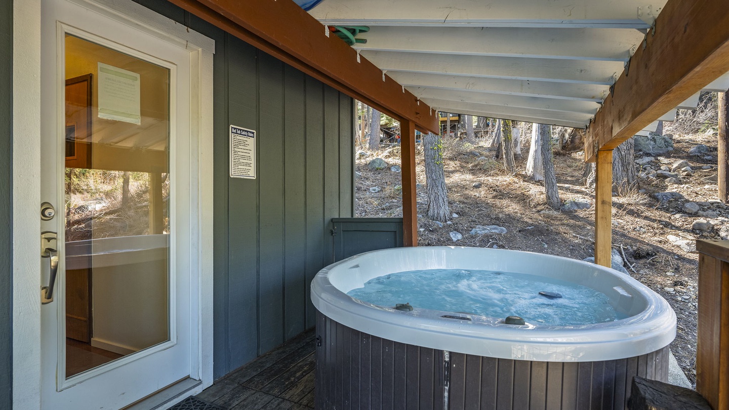 Slip into warm, bubbling waters while nature surrounds you. Your private hot tub offers the perfect retreat after exploring.