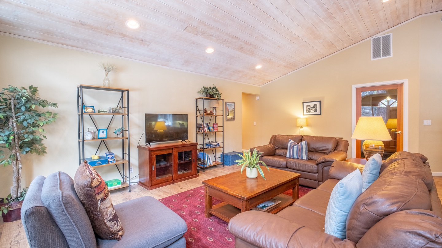 Living Room to Entry: Three Pines Family Cabin