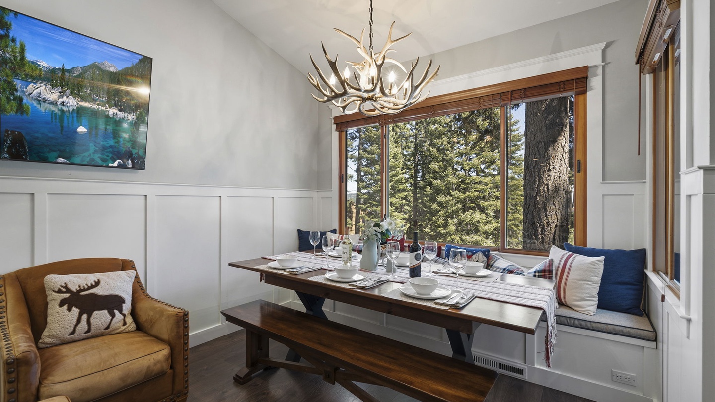 Gather around this beautiful dining table where rustic charm meets woodland elegance, surrounded by forest views and warm natural light.