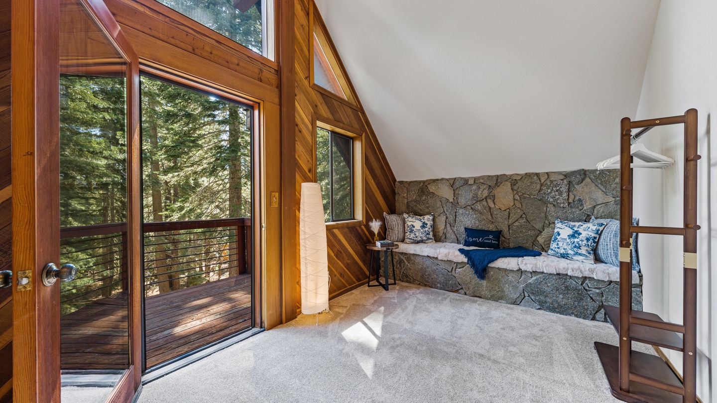 Natural light pours through vaulted windows, framing forest views from your private bedroom retreat. Step out to your own balcony and breathe in the mountain air.