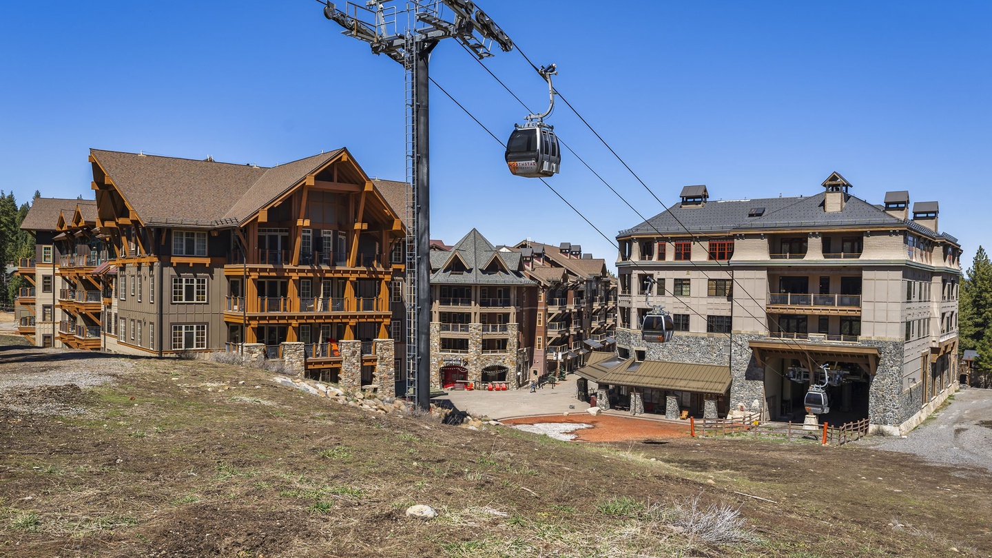 Ski-in Ski-out gondola running by.